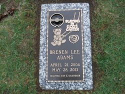 customized lawn-level memorial with bronze teddy bear