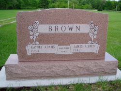 Customized upright memorial with engraved flowers
