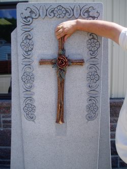 Customized cross on engraved memorial