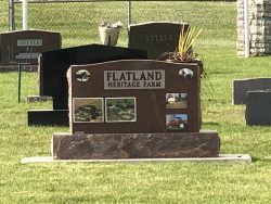 Customized upright memorial with multiple pictures on it