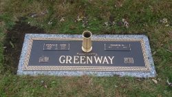 customized lawn-level memorial with bronze accents
