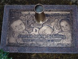 customized lawn-level memorial with engraved photos